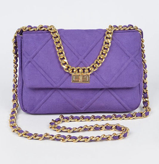 Purple suede-style quilted flap handbag with gold-tone chain strap and clasp