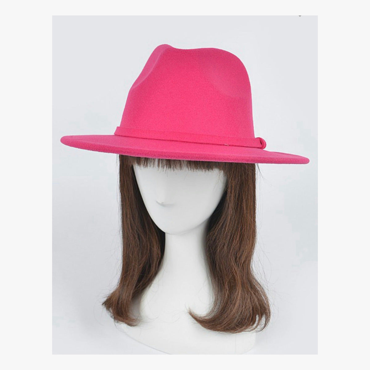 Hot pink fedora on mannequin