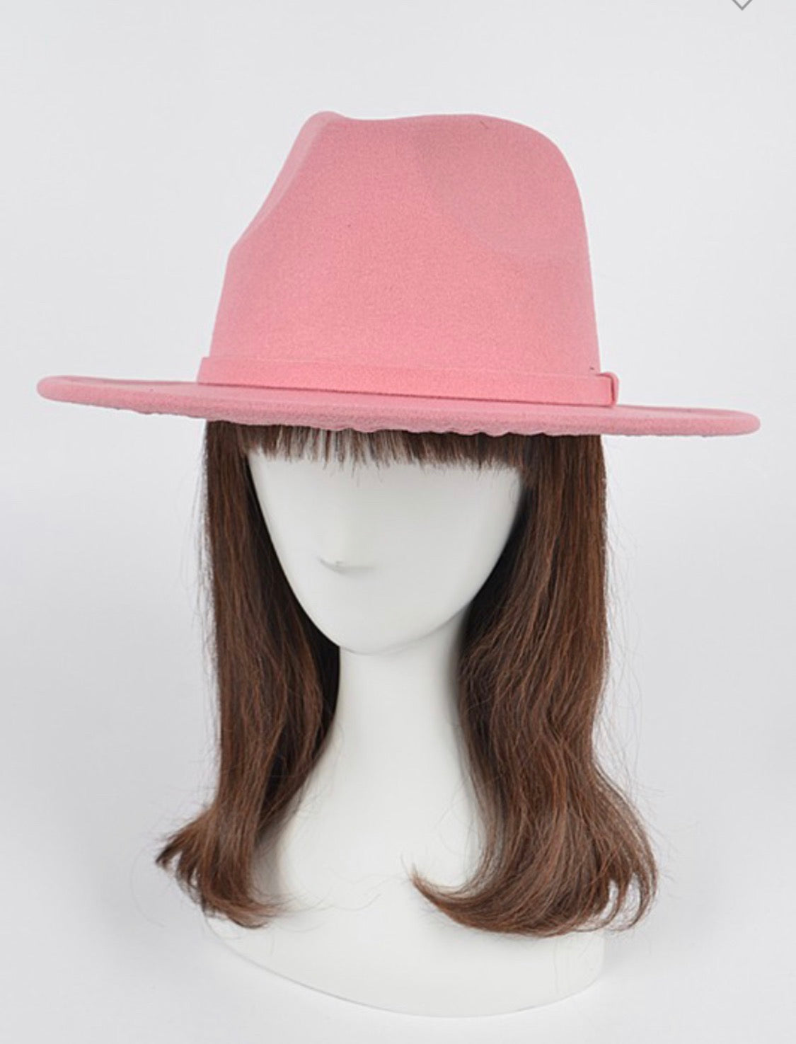 Pink fedora on mannequin